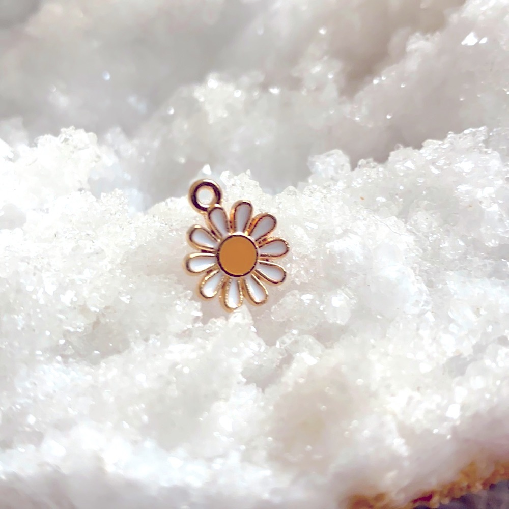3/$30 new gold plated and enamel daisy charm